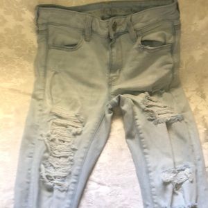 American Eagle | Distressed Next level stretch size 4